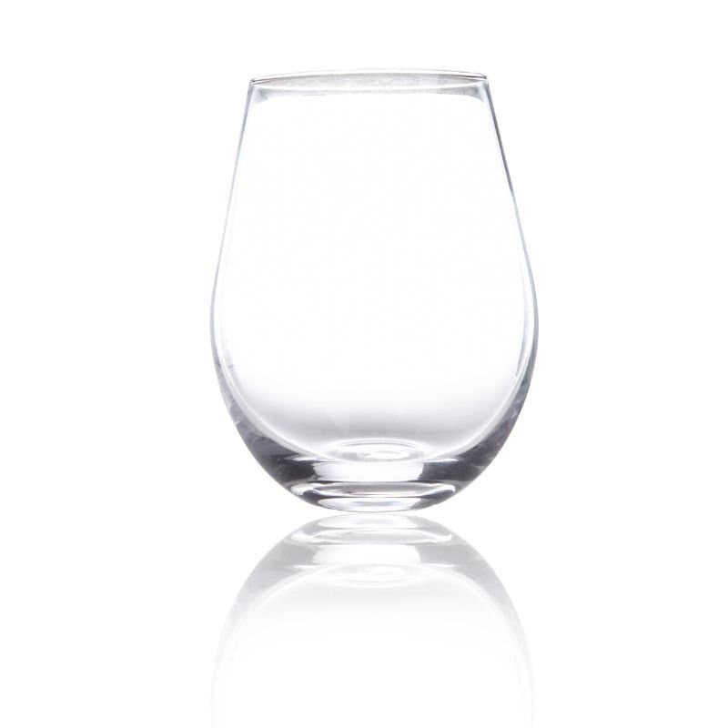 Clear stemless glass on a white background with a soft reflection underneath.